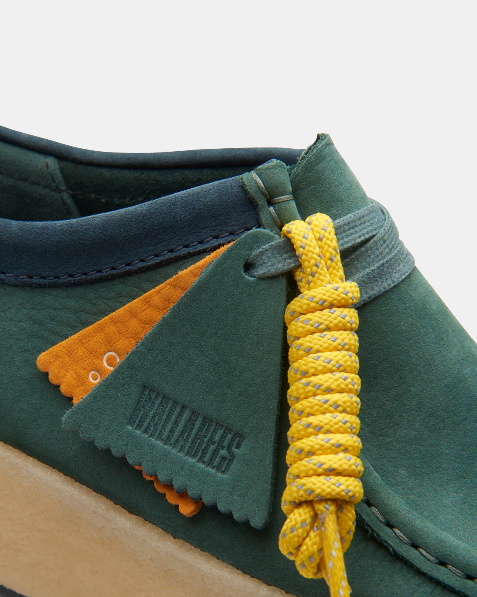 Green and store blue wallabees